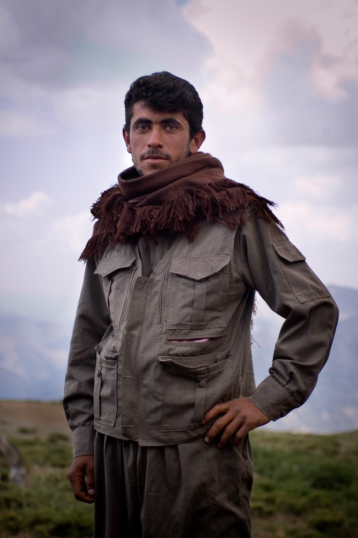Formal portrait of Peshmurga guard in remote mountain village, near Syria. 