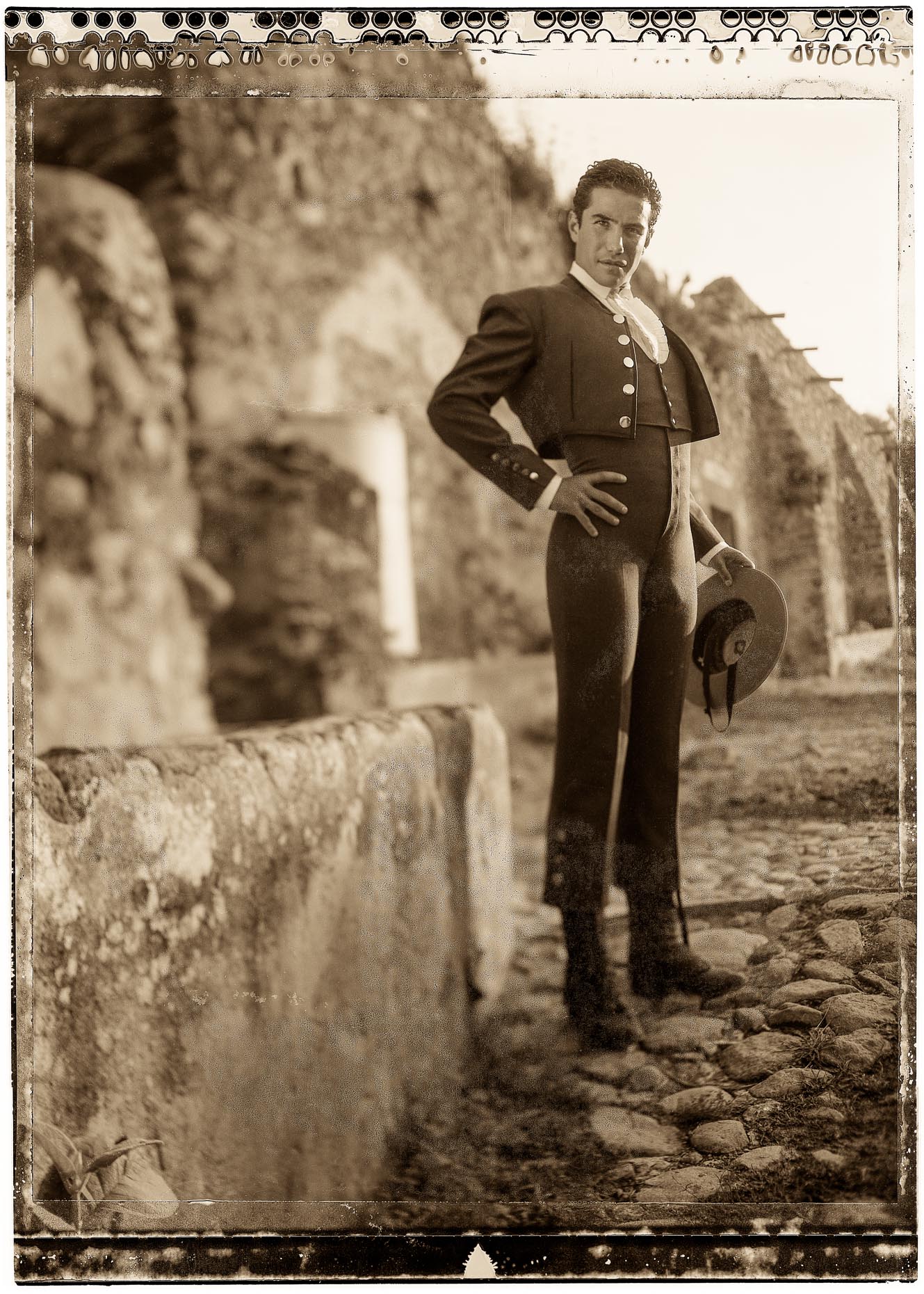Sepia toned portrait of young Matador