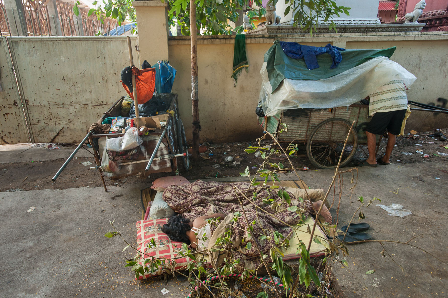 Homeless family in streets of Phnom Penh, Cambodia.