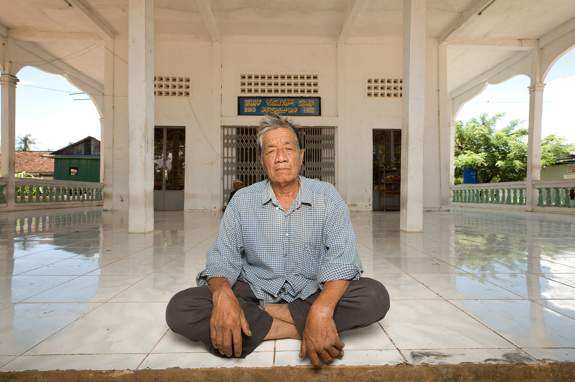 Environmental portrait of Khmer Rouge survivor Sok Sop Eal