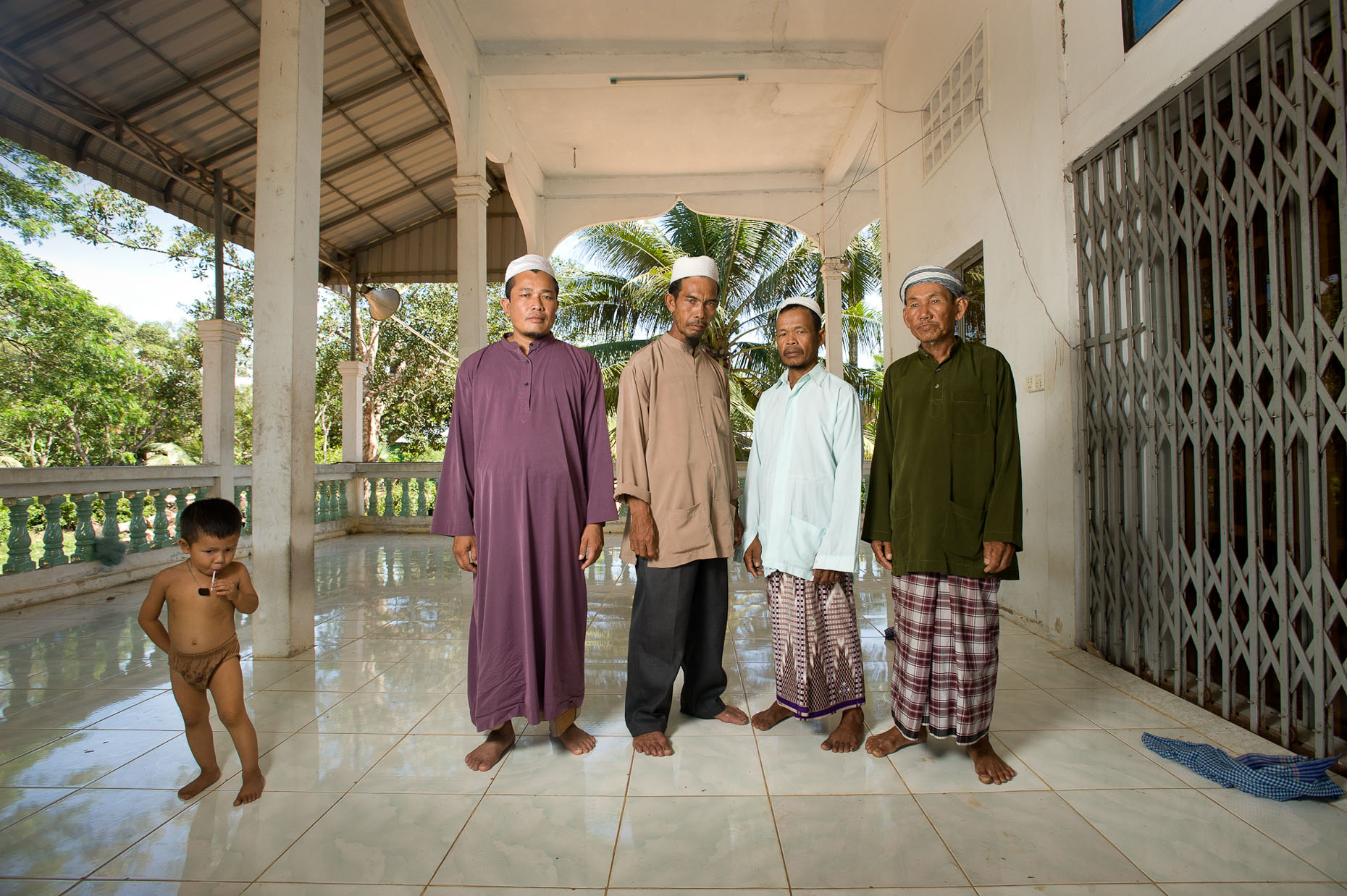 Environmental portrait of Khmer Rouge survivors in Cham village