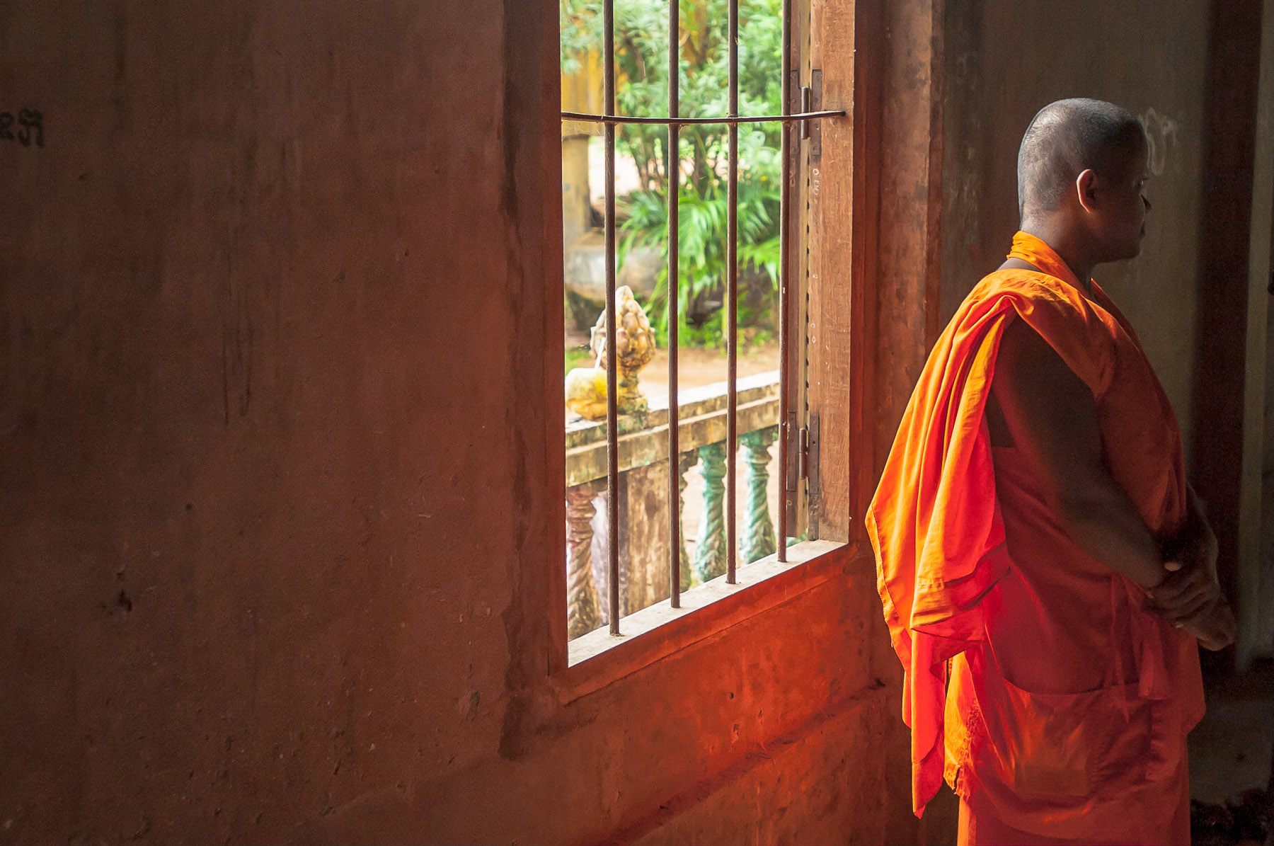 Buddhist Monk in former prison near Kampot, Cambodia