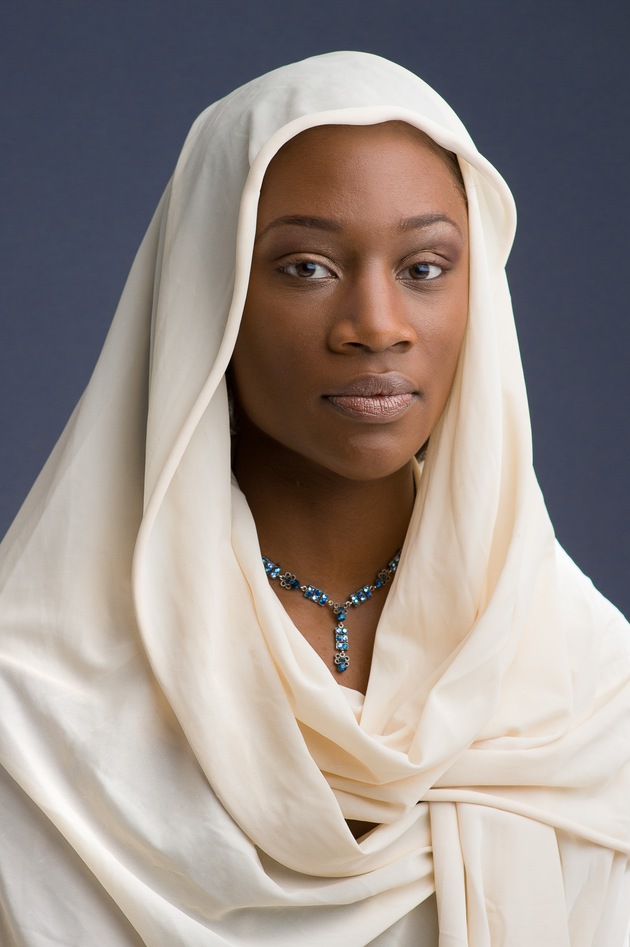 Fashion portrait of youg black woman with head scarf