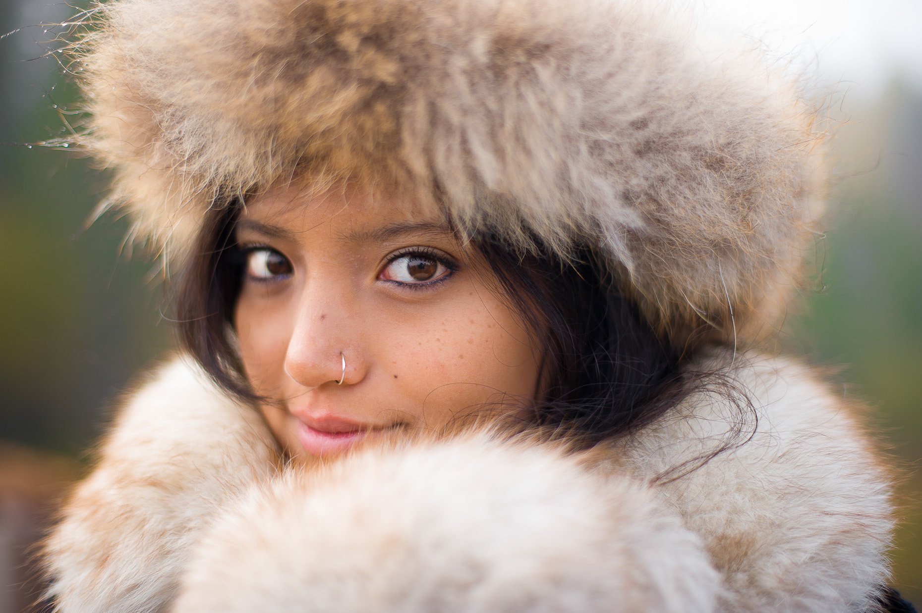 Outdoor fashion portrait of young woman 