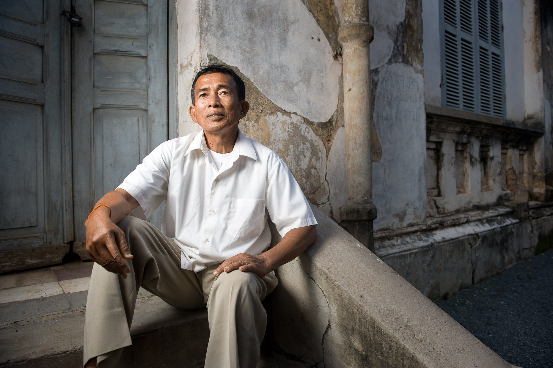 Environmental portrait of Khmer Rouge survivor Sam Sokhun