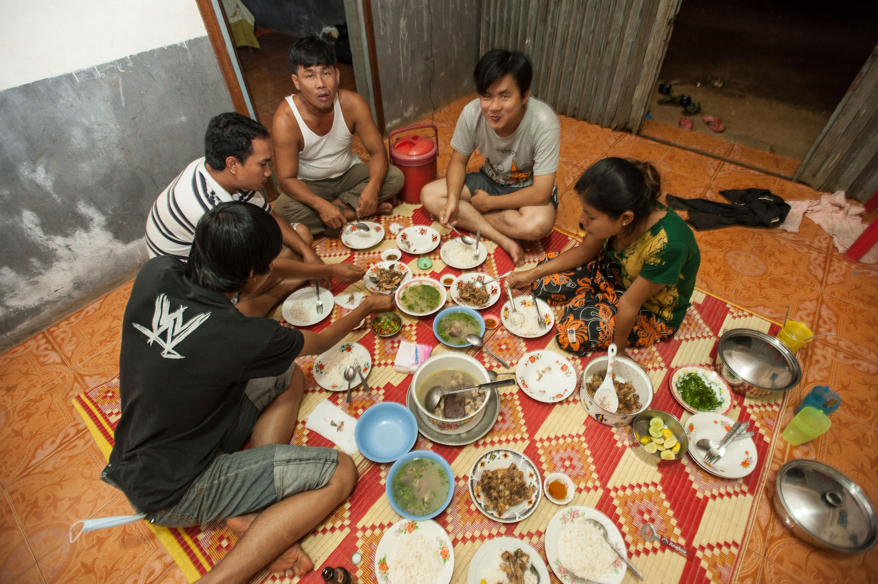 Family style meal on the floor of a hostel, near Thai border.