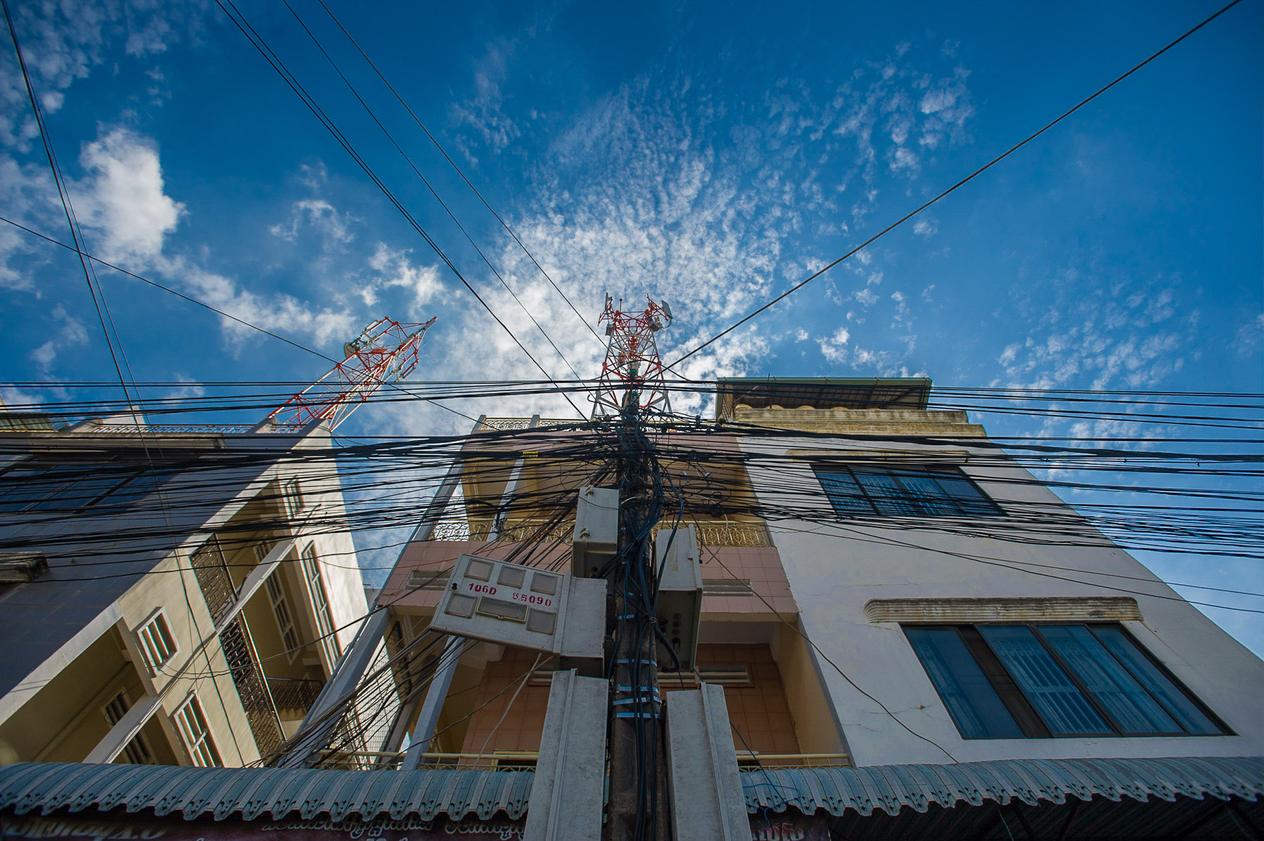 Clustered powerlines on electric pole, Phnom Penh, Cambodia. 