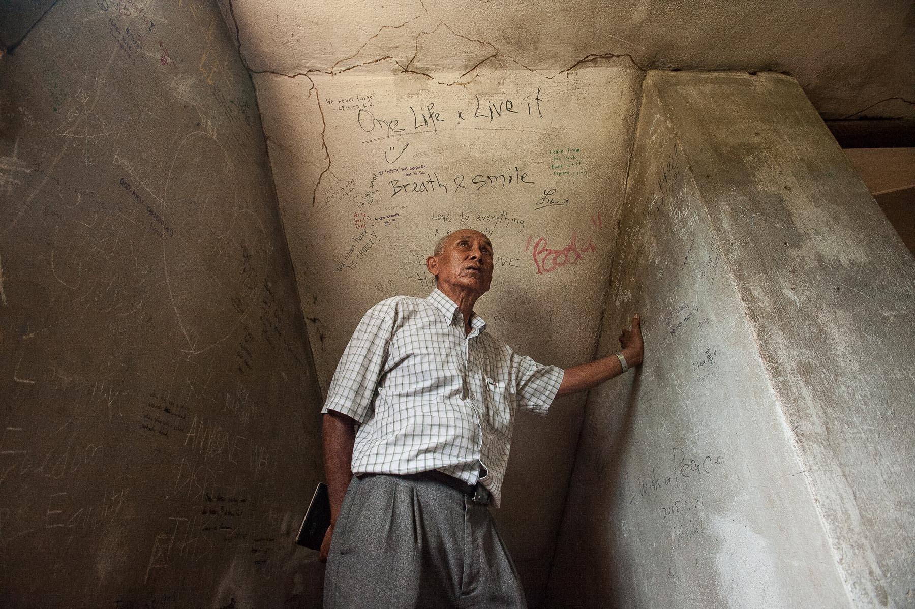 Khmer Rouge survivor, Chum Mey inside the Toul Sleng prison in Phnom Penh, Cambodia. 