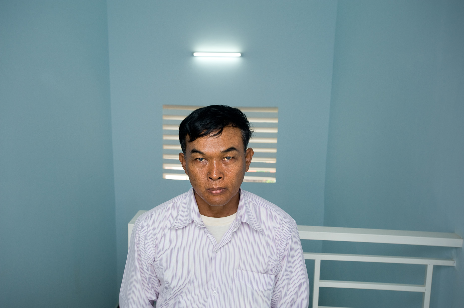 Environmental portrait of Khmer Rouge survivor Yun Bin